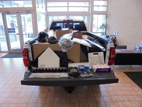 Henry Martens Buick GMC Truck full of donations